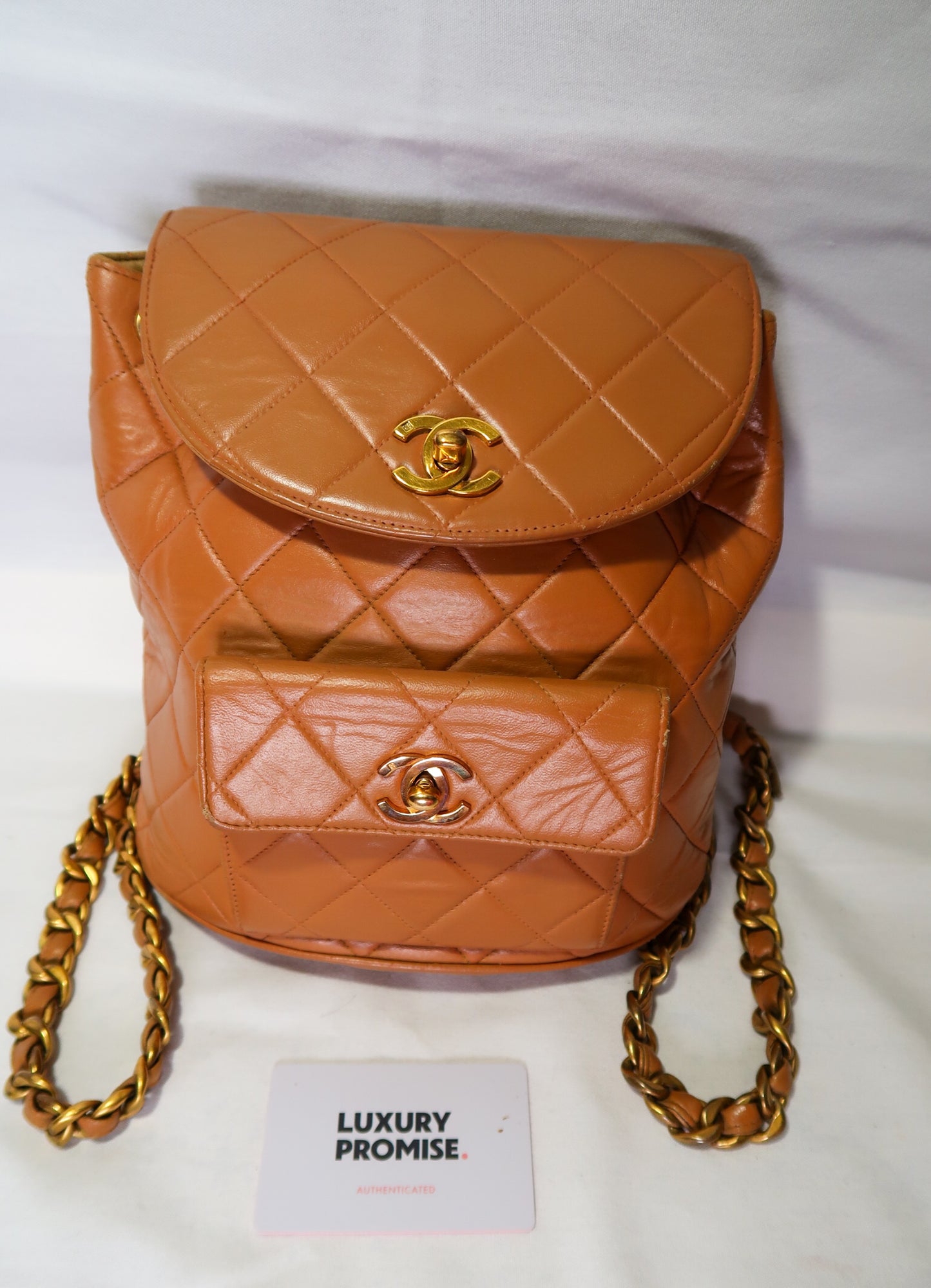 Chanel Lambskin Quilted Drawstring Backpack Camel