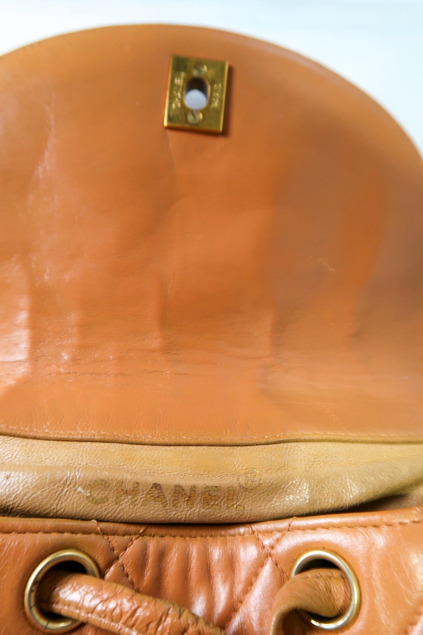 Chanel Lambskin Quilted Drawstring Backpack Camel