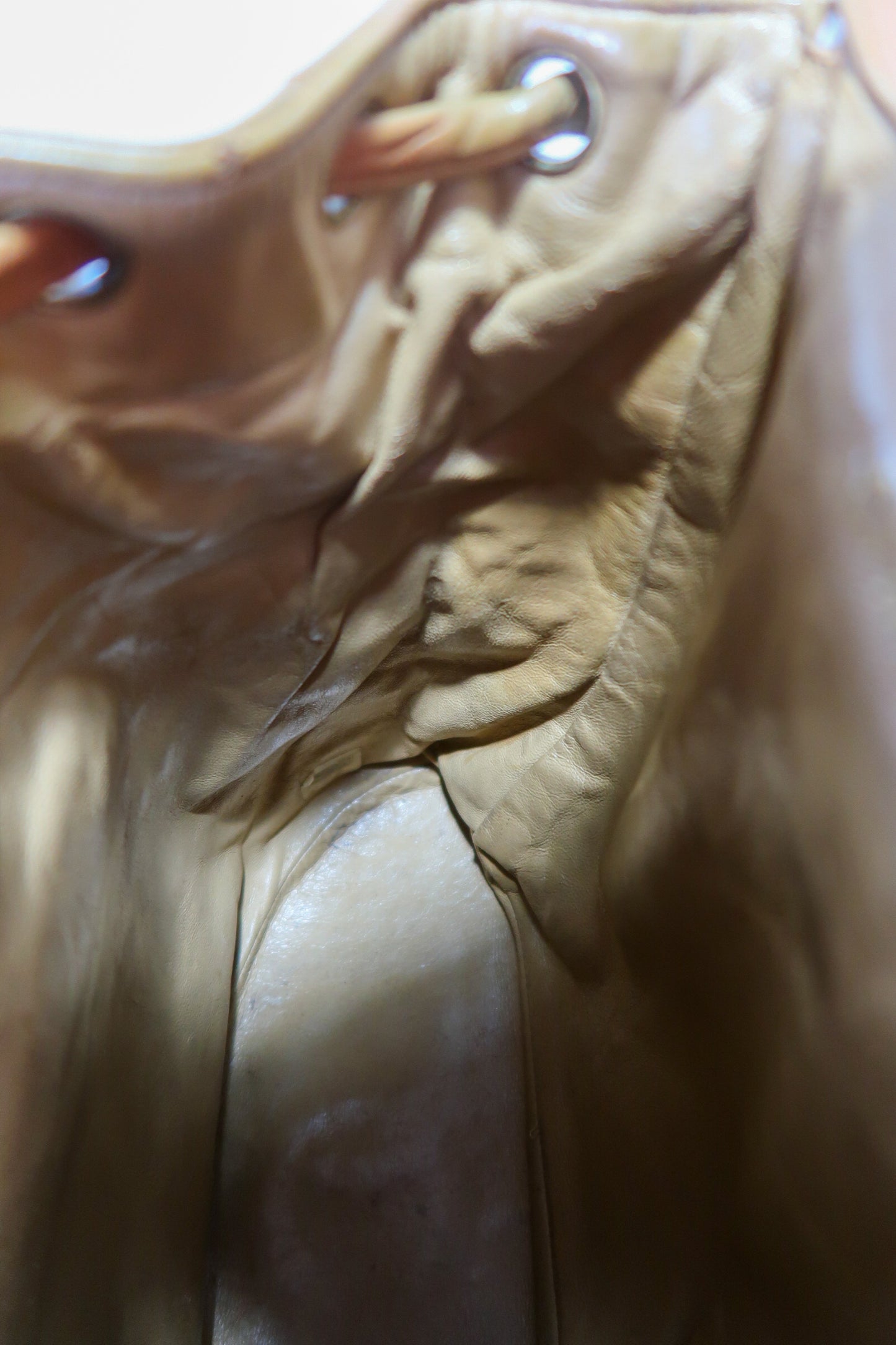 Chanel Lambskin Quilted Drawstring Backpack Camel