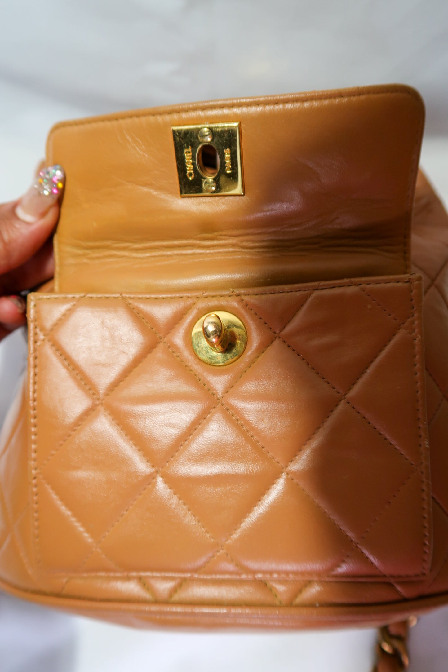 Chanel Lambskin Quilted Drawstring Backpack Camel