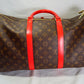 Louis Vuitton Keepall Bandoulière 50 – Monogram Canvas with Red Leather Trim