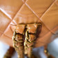 Chanel Lambskin Quilted Drawstring Backpack Camel