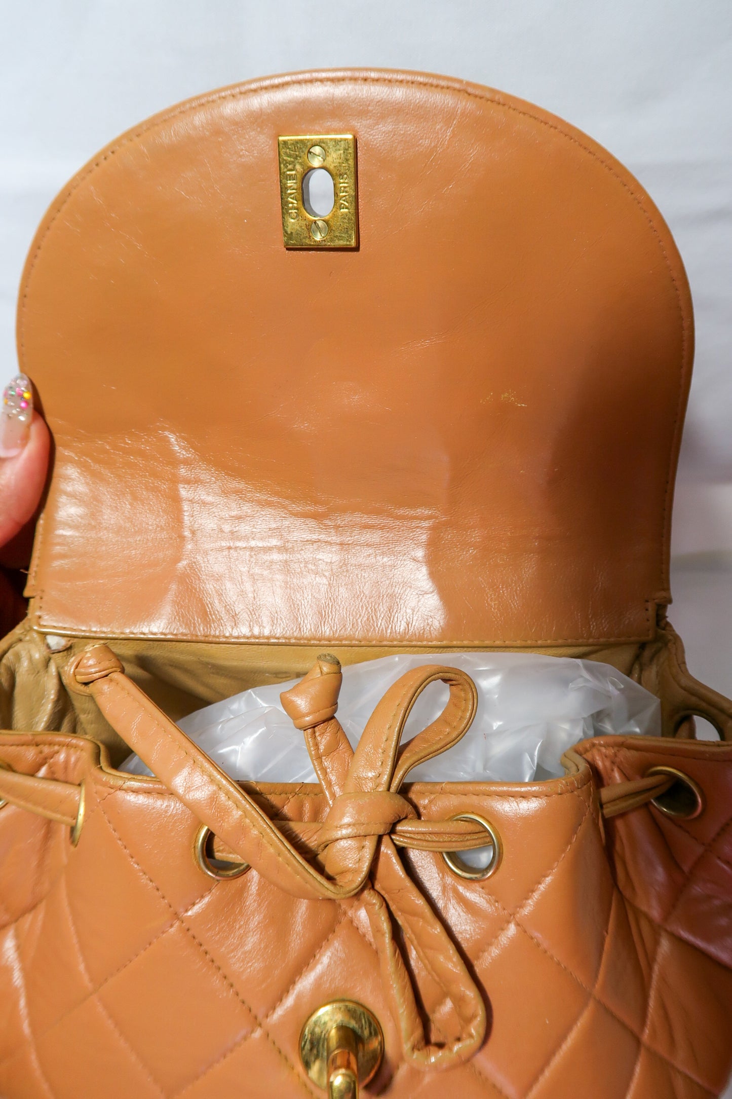 Chanel Lambskin Quilted Drawstring Backpack Camel