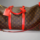 Louis Vuitton Keepall Bandoulière 50 – Monogram Canvas with Red Leather Trim